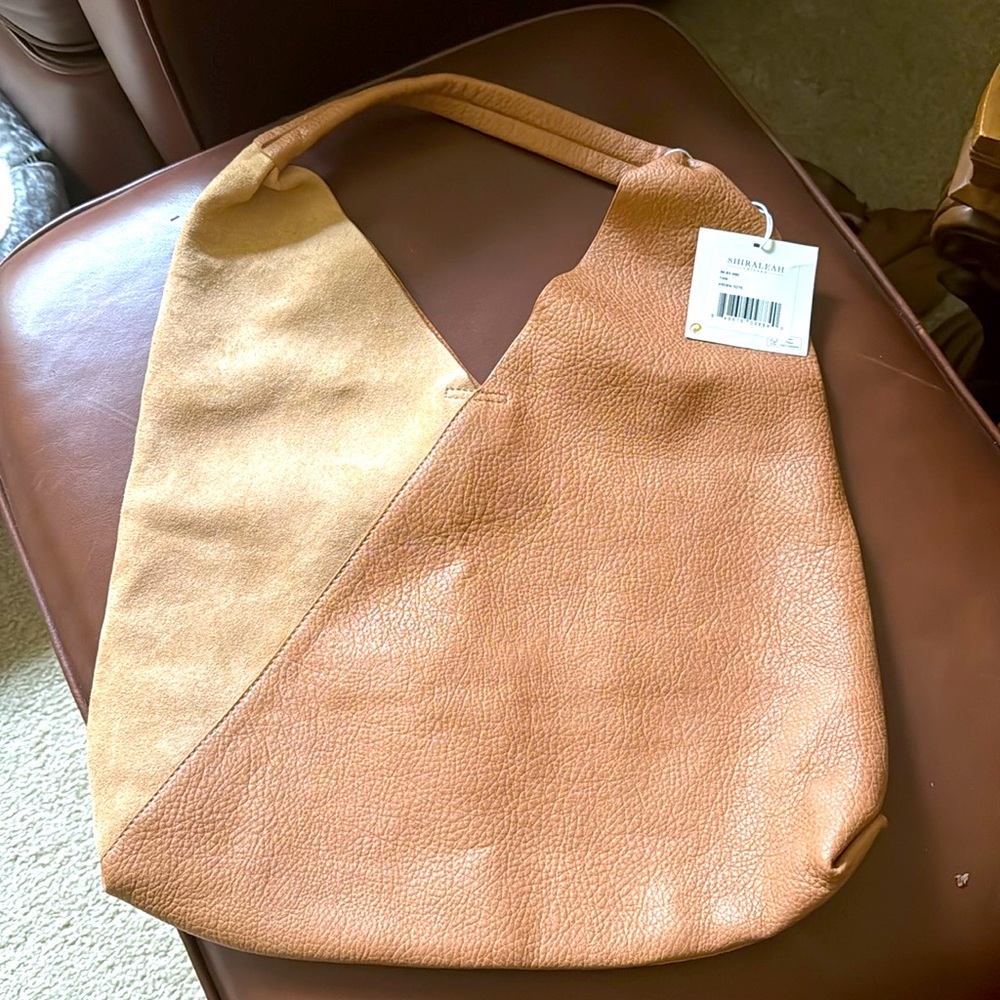 Vegan leather tote bag.  Never used tags on!
